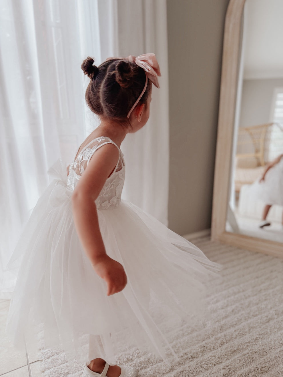 White flower girl dress with embroidered bodice and bow