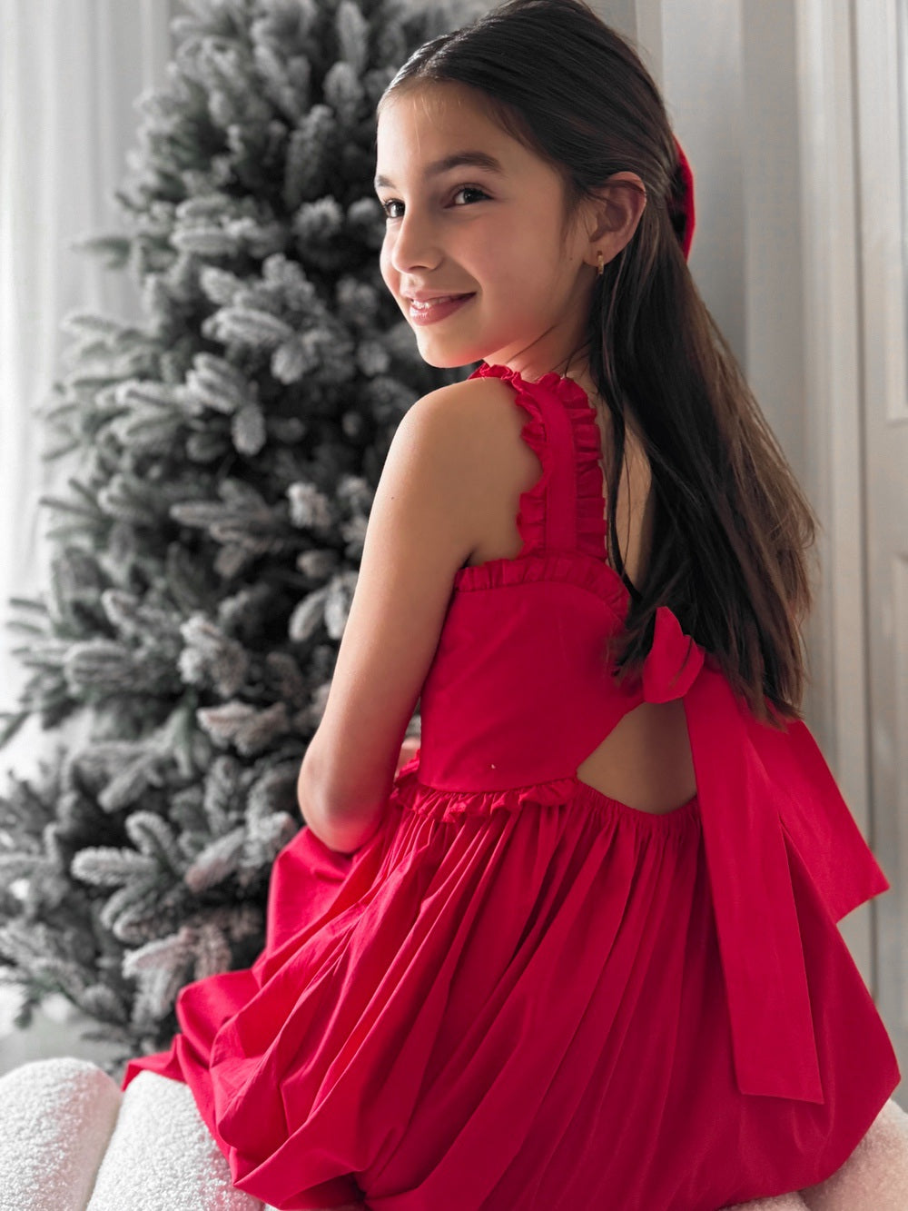 Eden Girls Midi Christmas Dress - Christmas Dresses and RompersClose-up of ruffle bodice and bow back on Eden Girls Midi Christmas Dress