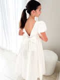 view of Elise Girls Full Length White Satin Dress with puff sleeves and flowing satin skirt