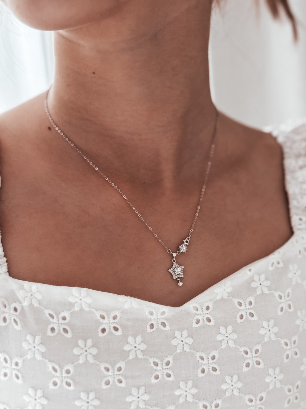 Girls silver necklace with dainty star design