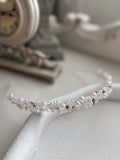 Silver Pearl Headband flat lay – pearls and beads on silver band for weddings and communions
