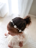 Flower girl wearing Ever After Silver Headpiece – elegant accessory for weddings and special occasions