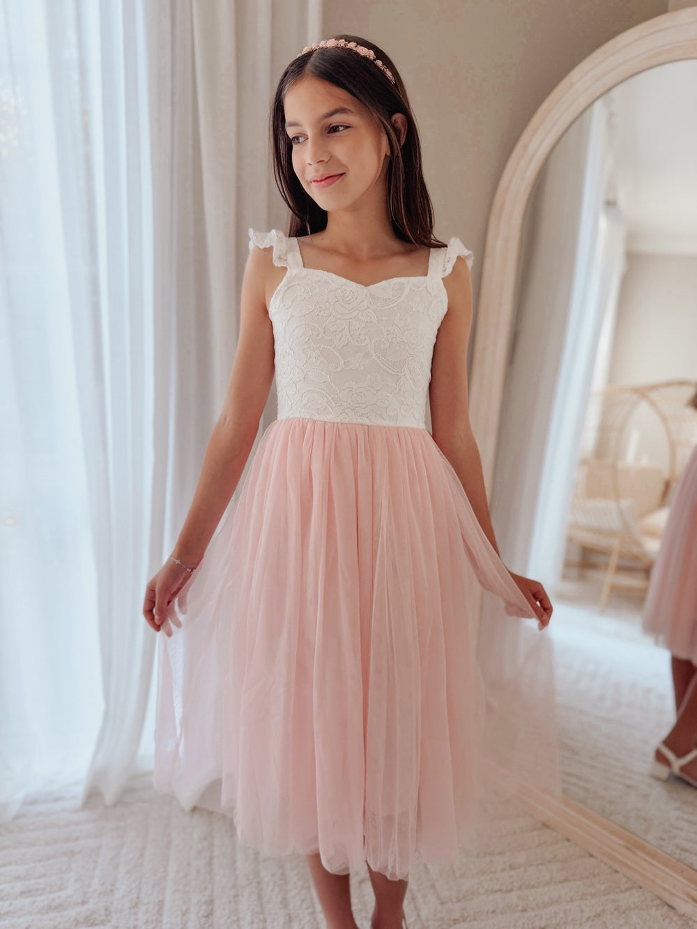 Girls soft pink tulle dress with lace bodice and ruffle shoulders