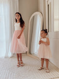 Soft pink girls dress for junior bridesmaid midi length