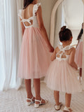 Soft pink girls dress for junior bridesmaid midi length