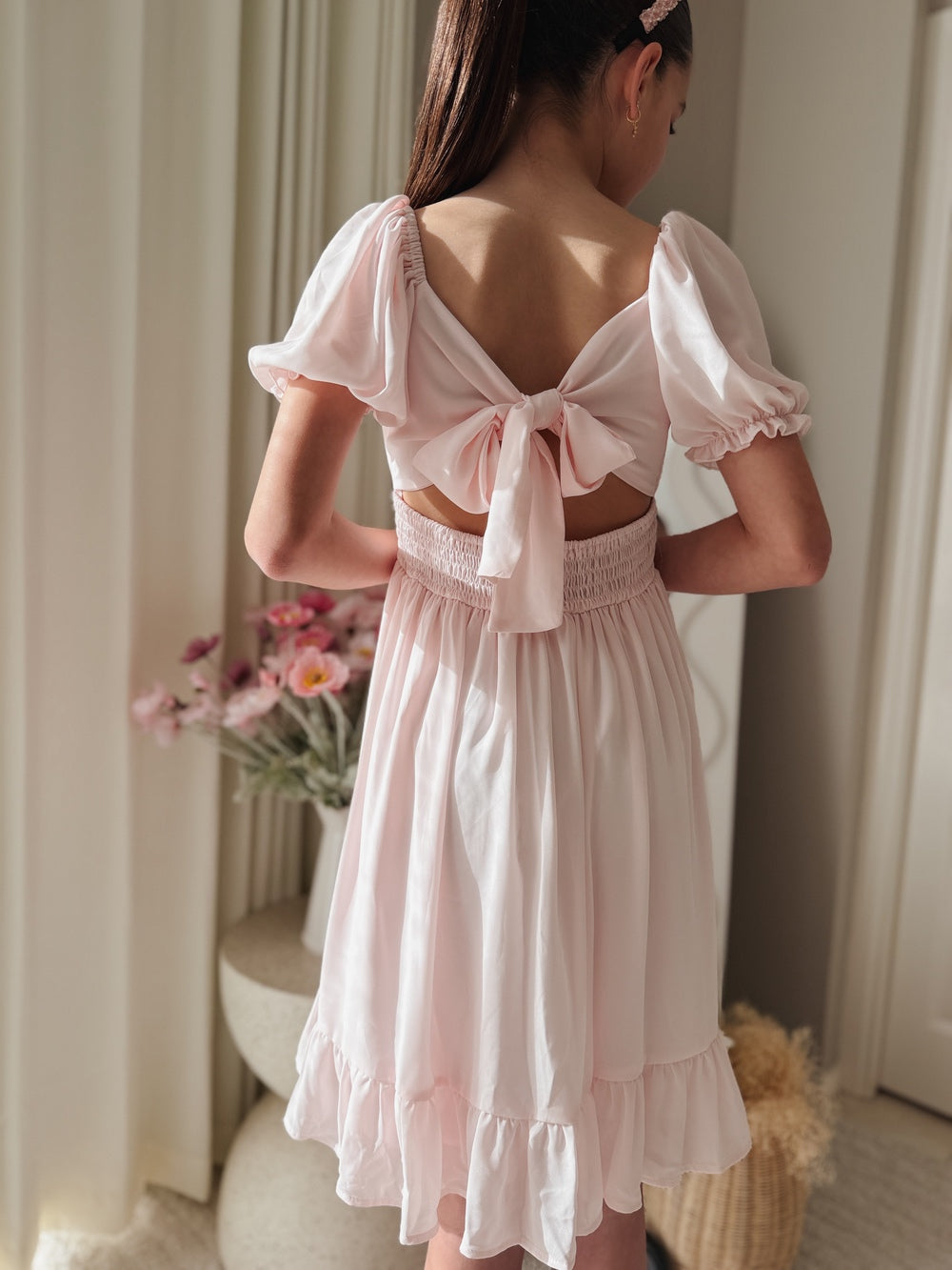 Pale pink flower girl dress with puff sleeves