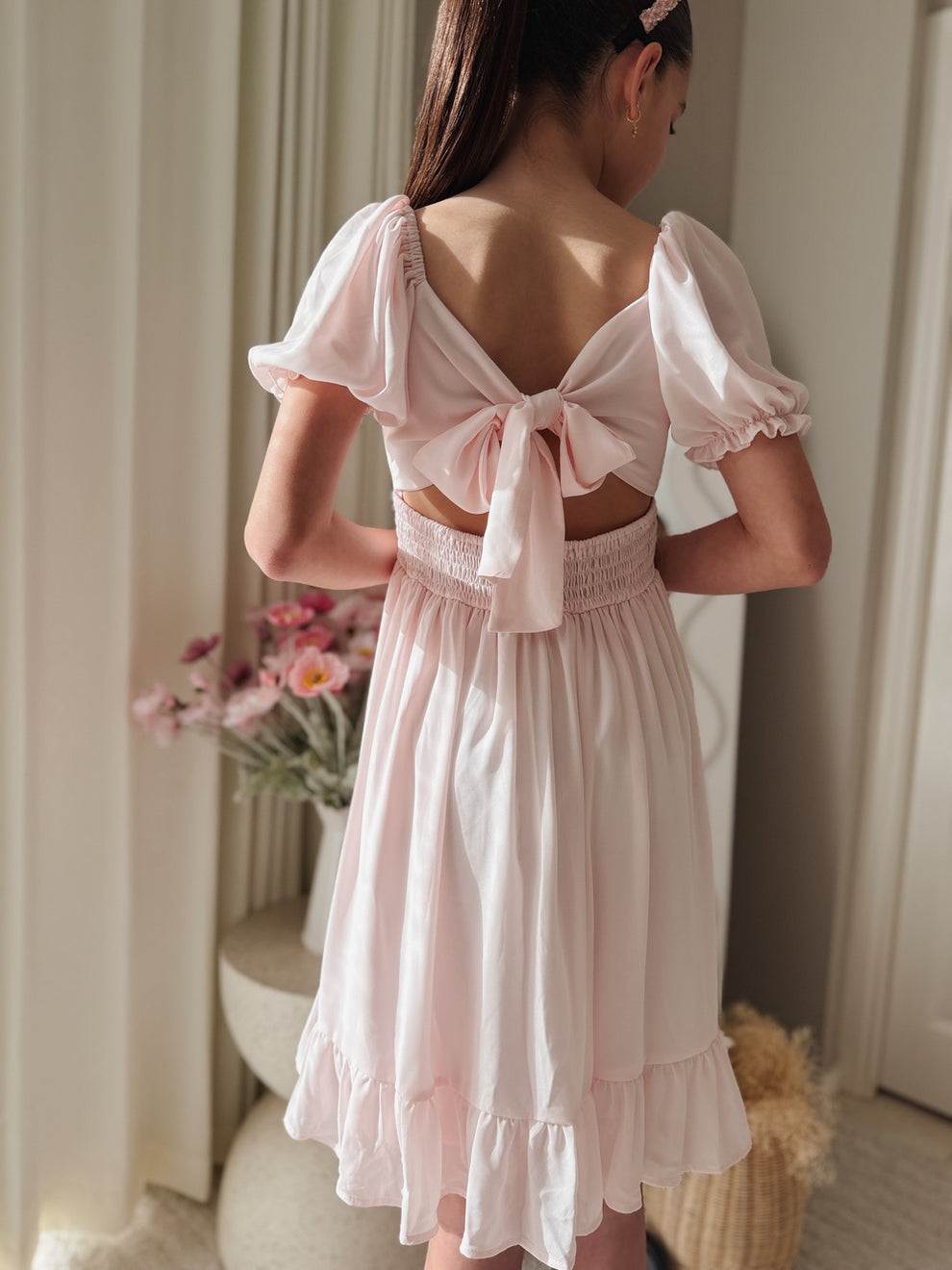 Pale pink flower girl dress with puff sleeves
