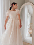 girls special occasion dress champagne shimmer fabric puff sleeve
