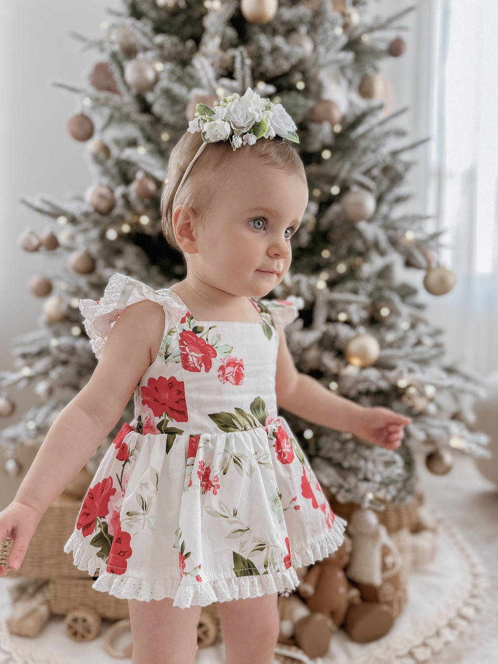 Faith Floral Baby Romper styled for Christmas family photos with matching jewellery and headband