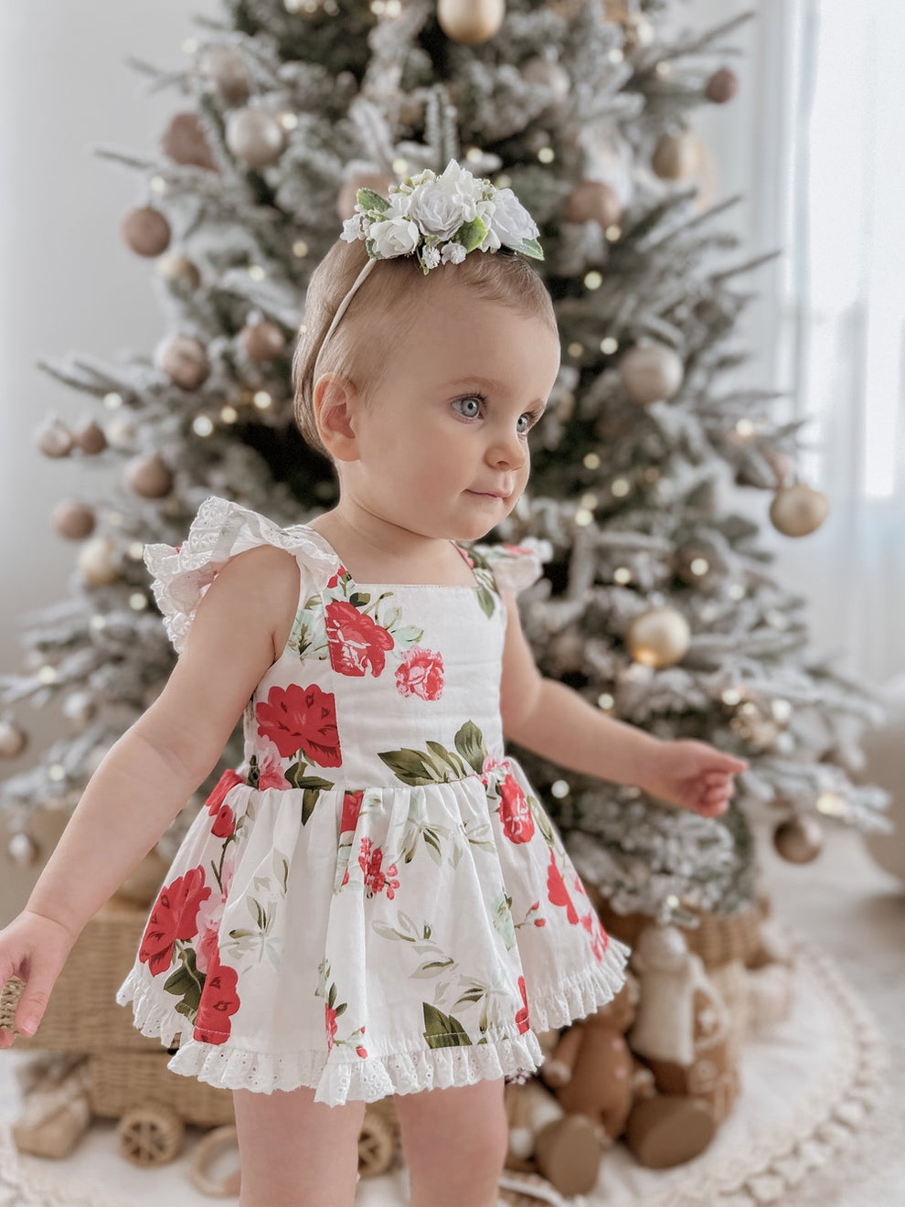 Faith Floral Baby Romper styled for Christmas family photos with matching jewellery and headband