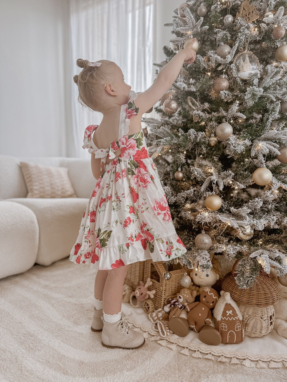 Side view of Faith Christmas Rose Dress showing flowing skirt and floral print