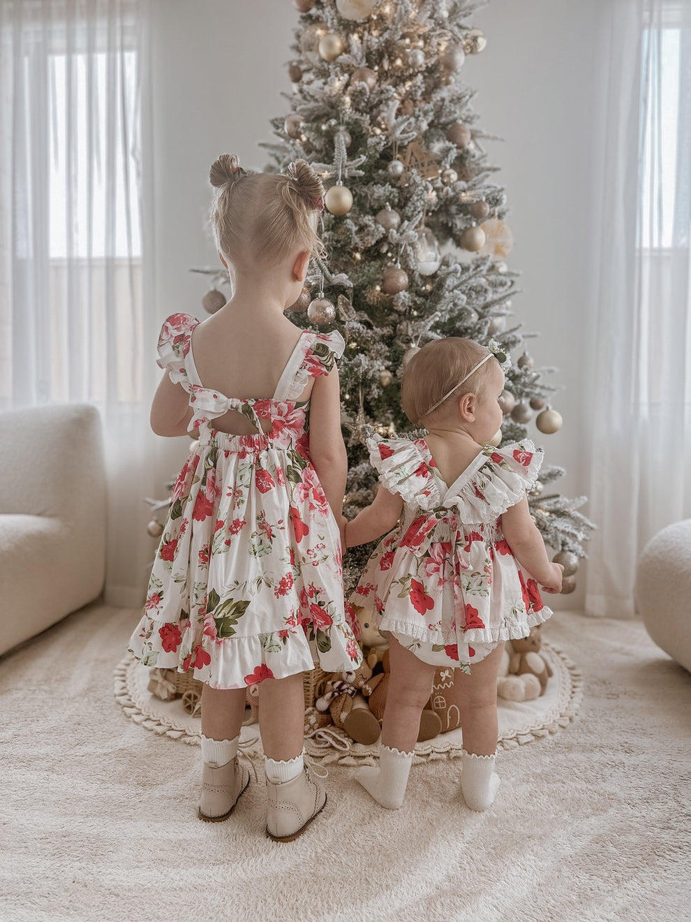 Faith Girls Christmas Rose Dress styled with festive pigtail bows