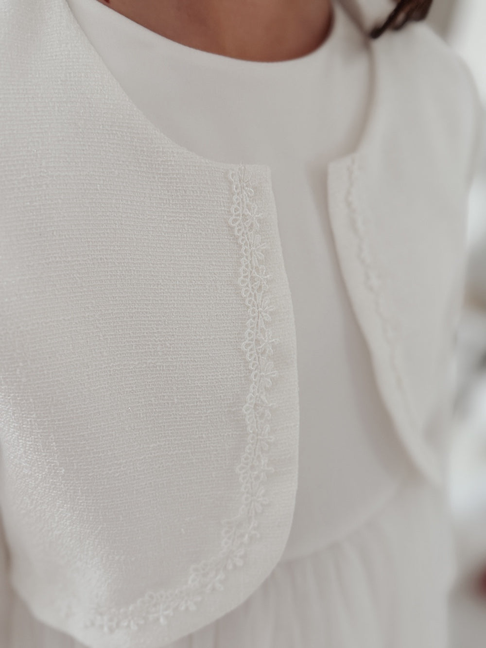 girls white Communion jacket with delicate trim