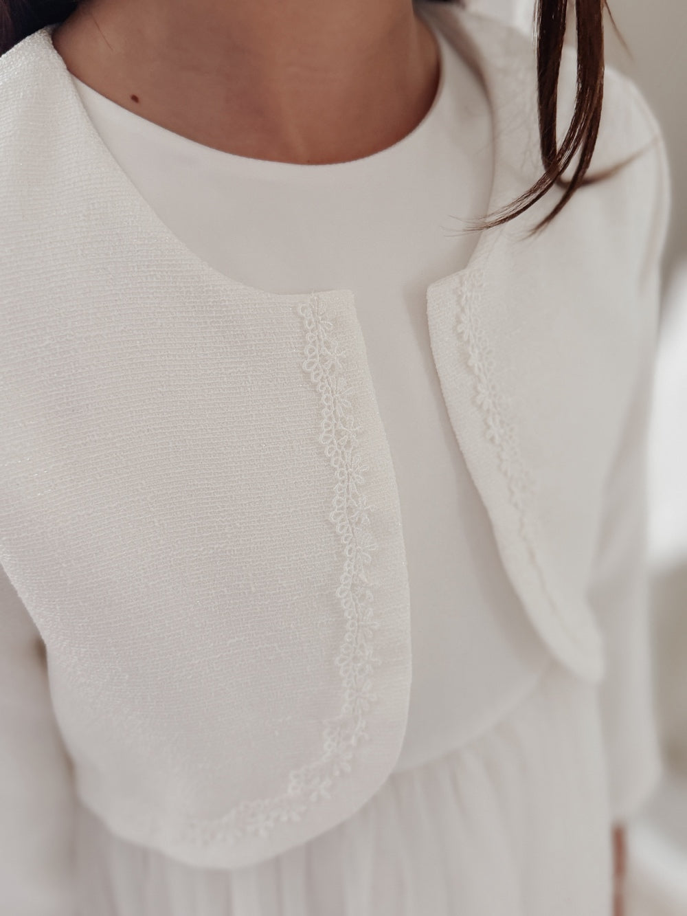 girls white Communion jacket with delicate trim