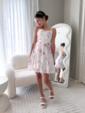 Felicity girls purple floral dress with bow back.