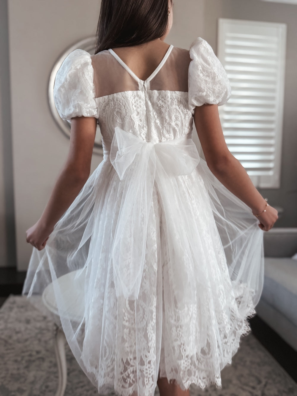 Genevieve white dress with bow back and puff sleeves