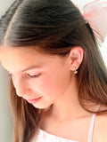 Side view of Girls Gold Flower Earrings – elegant gold hoops with crystal-encrusted floral pendants