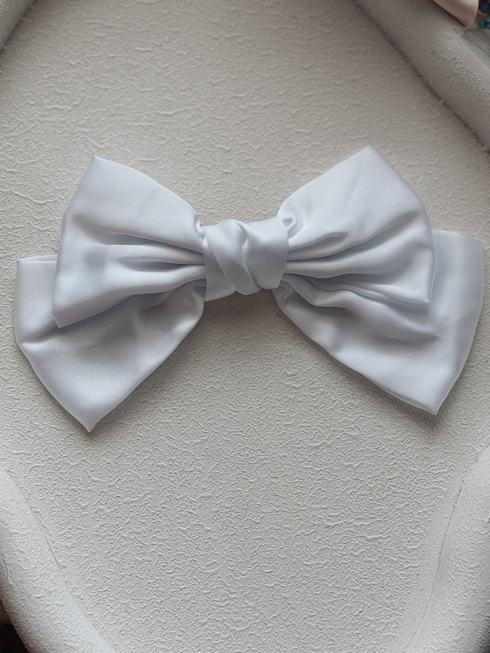 Oversized white satin bow for girls