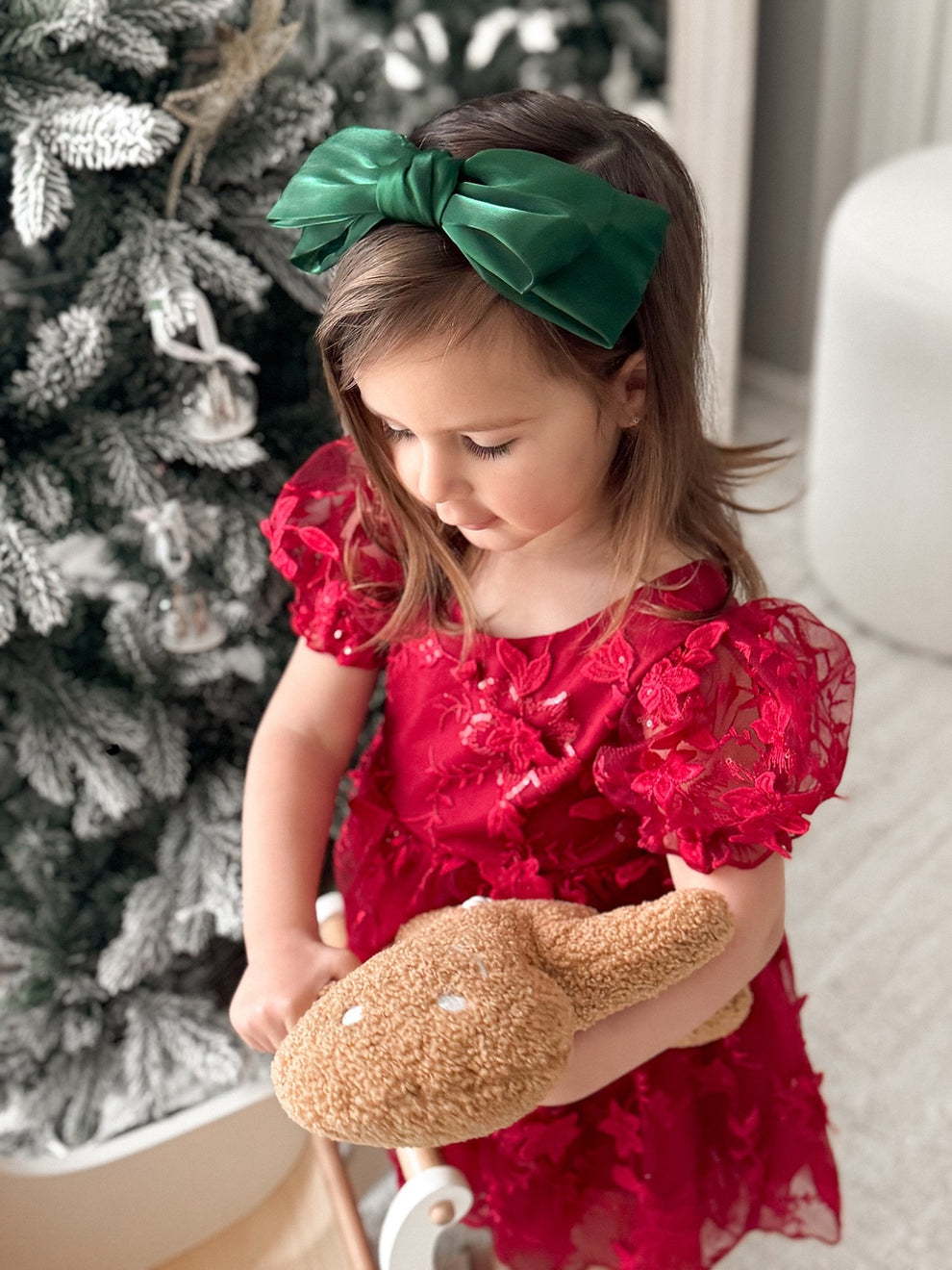 Large green bow on soft elastic headband – girls Christmas accessory