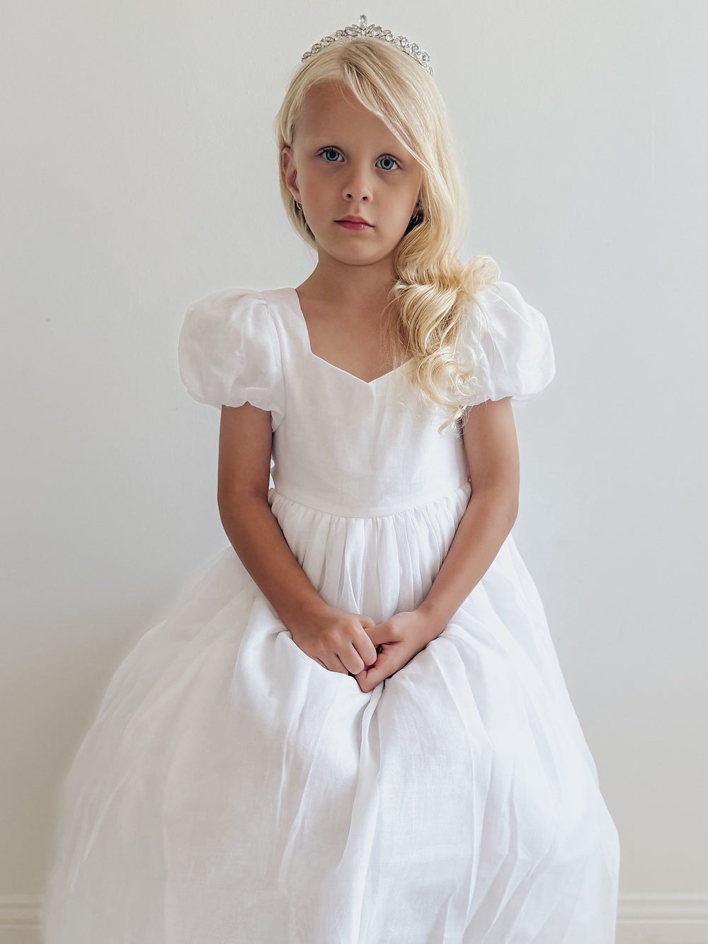 Gardenia white occasion dress with sweetheart neckline and puff sleeves