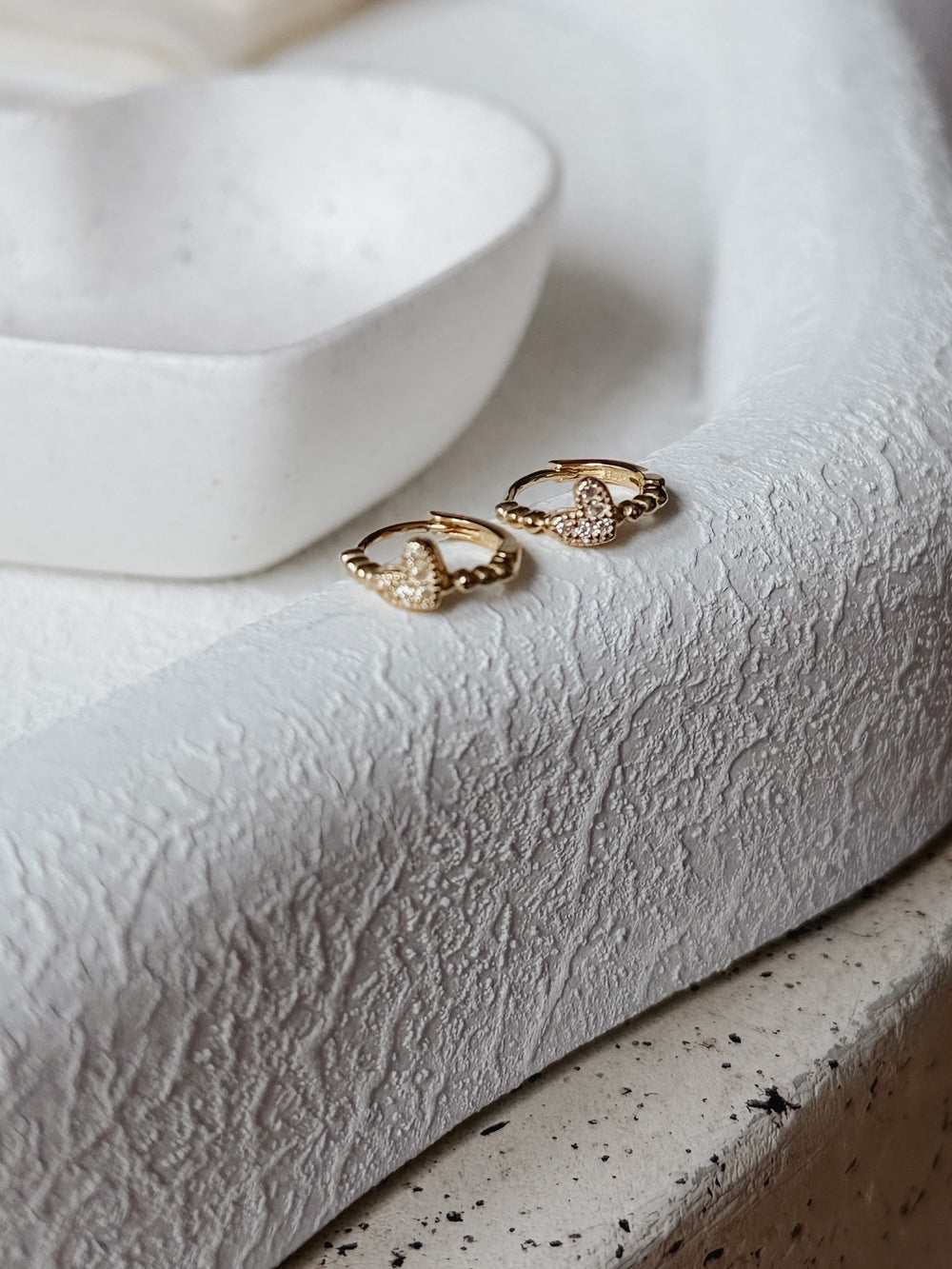 Gold-plated girls hoop earrings with sparkling heart detail
