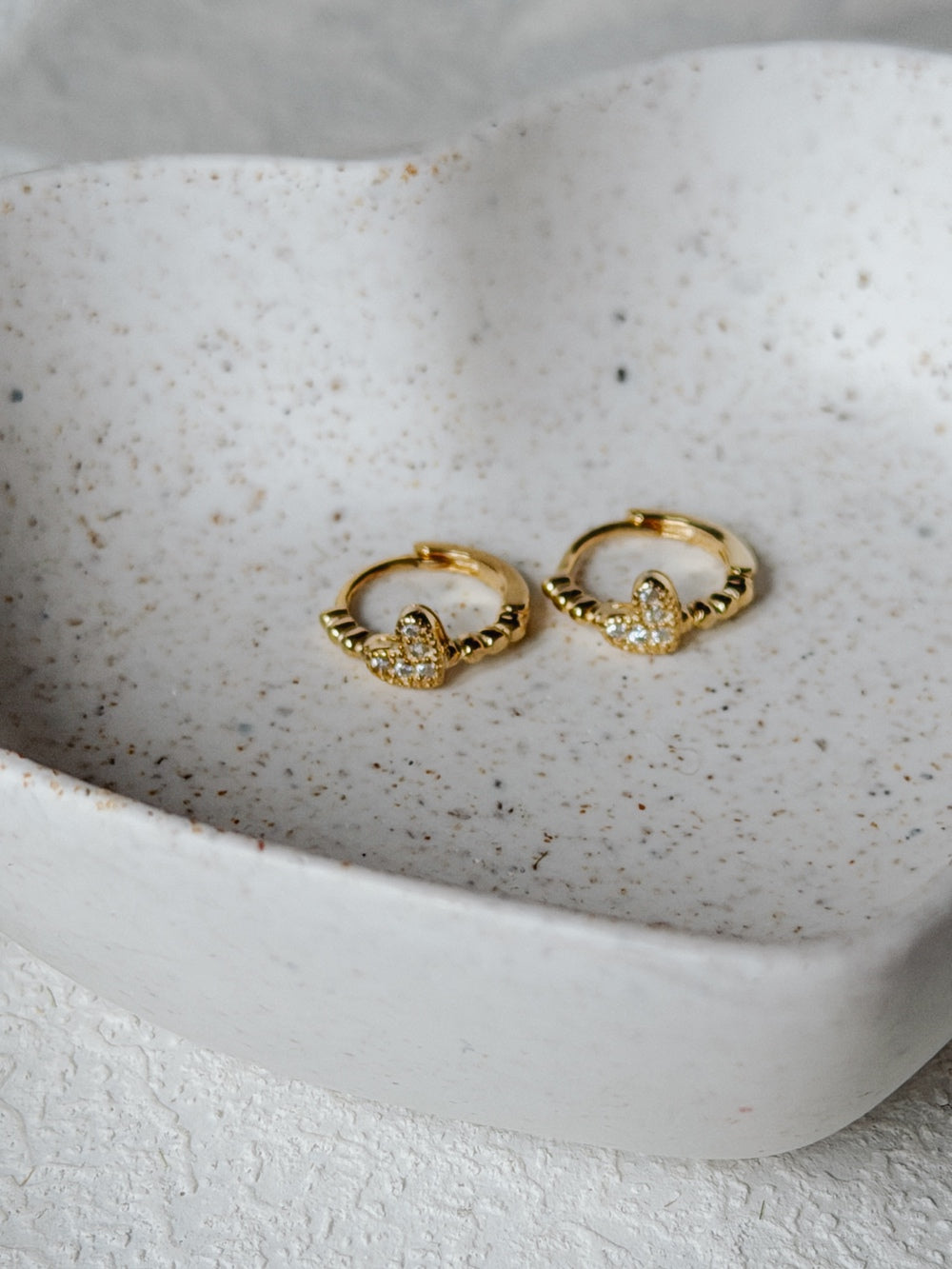 Gold-plated girls hoop earrings with sparkling heart detail