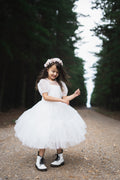 White communion dress with puff sleeves, modern style