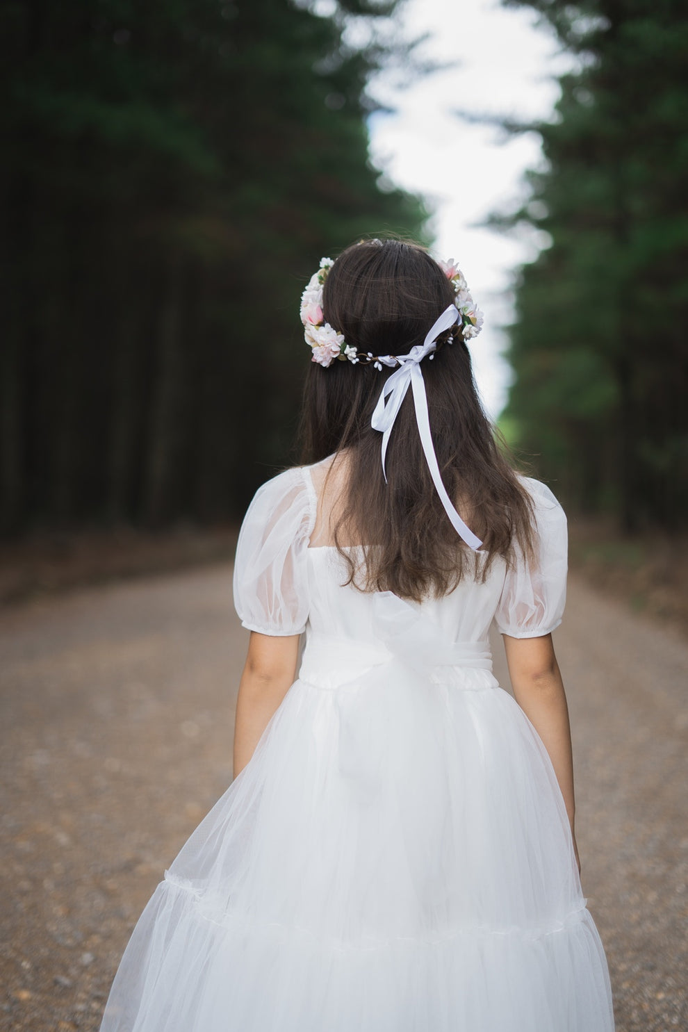 White communion dress with flower crown