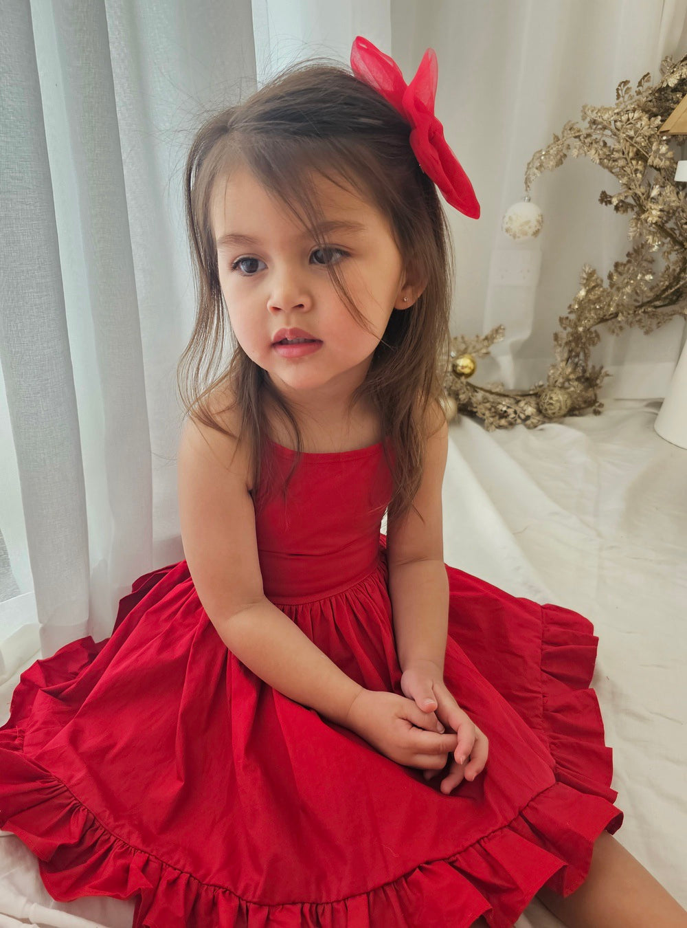 Red girls Christmas dress with large back bow and soft flared cotton skirt