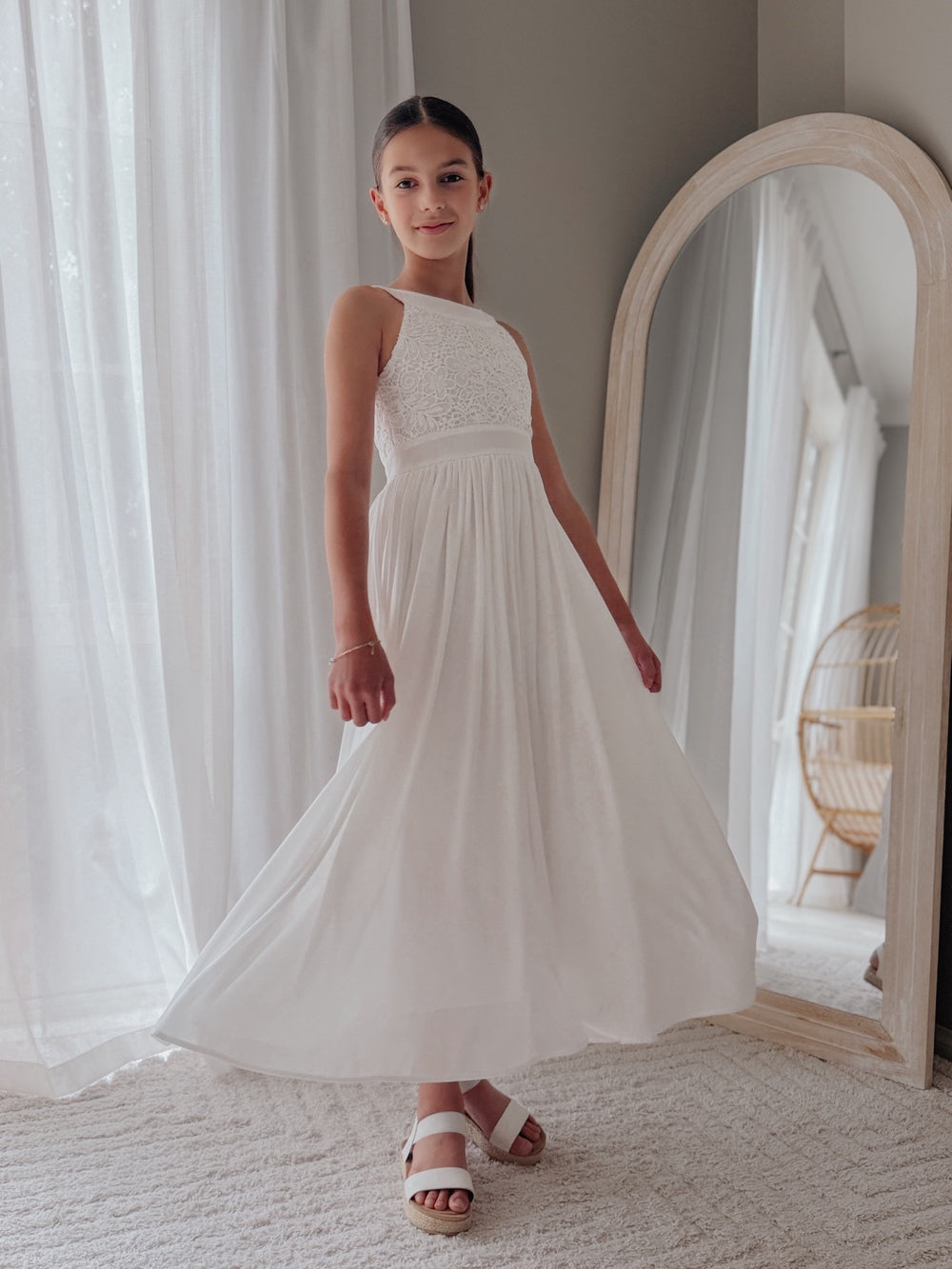 Girls white communion dress with lace bodice and flowing skirt