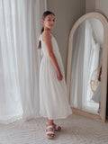 Elegant white girls dress for First Holy Communion photos