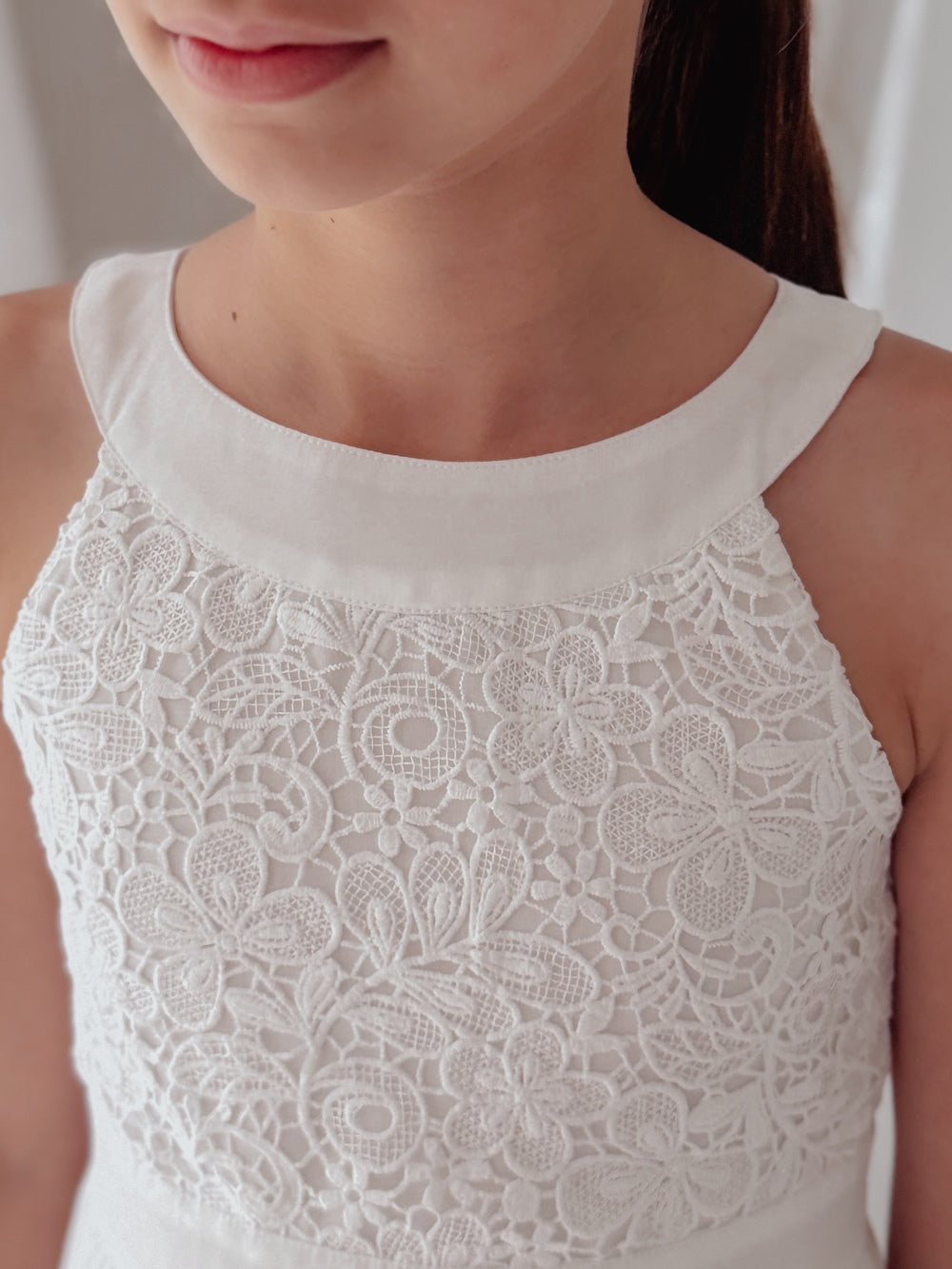 White embroidered bodice with high neck