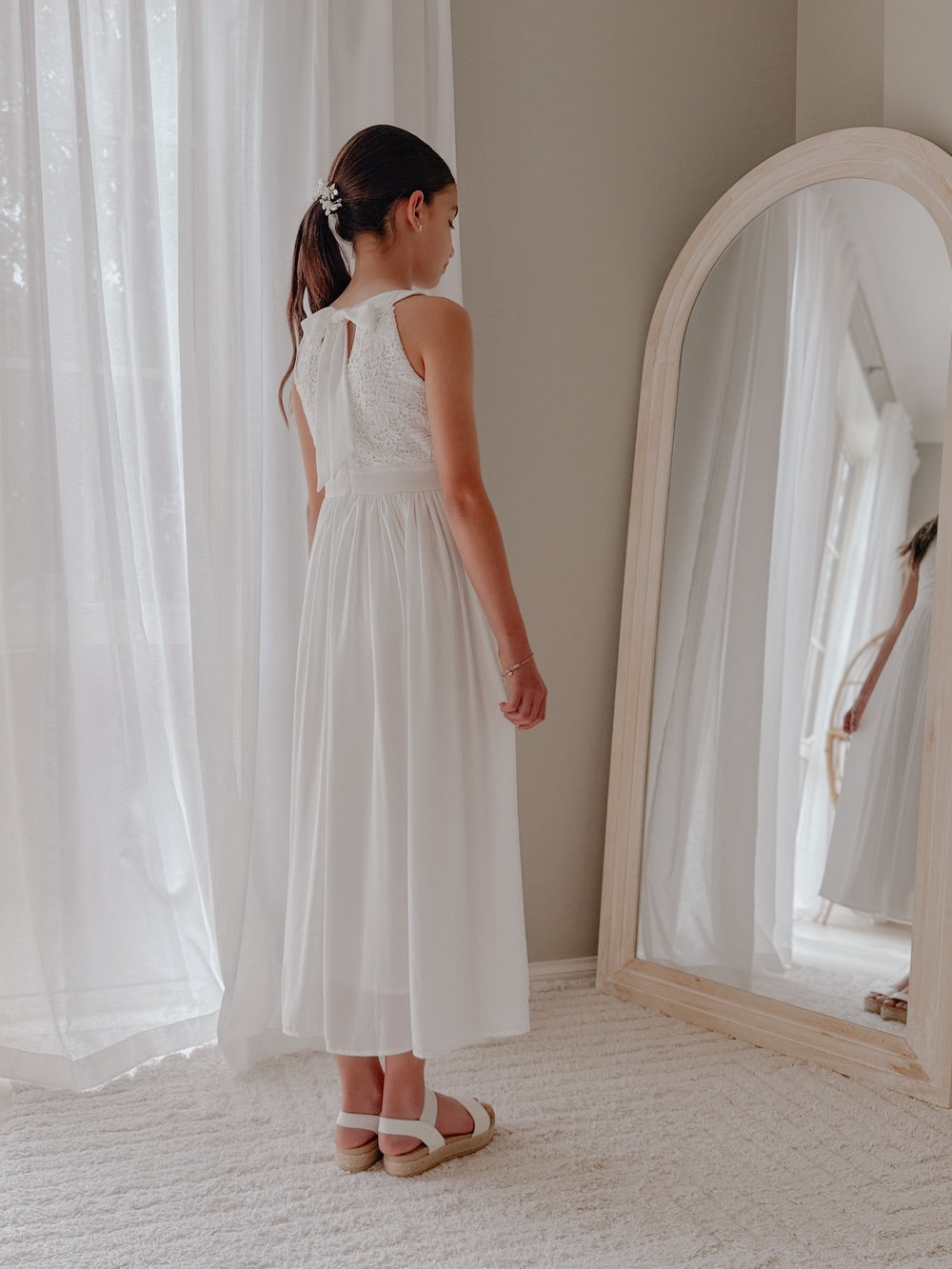 White girls formal dress with embroidered overlay bodice and defined waist