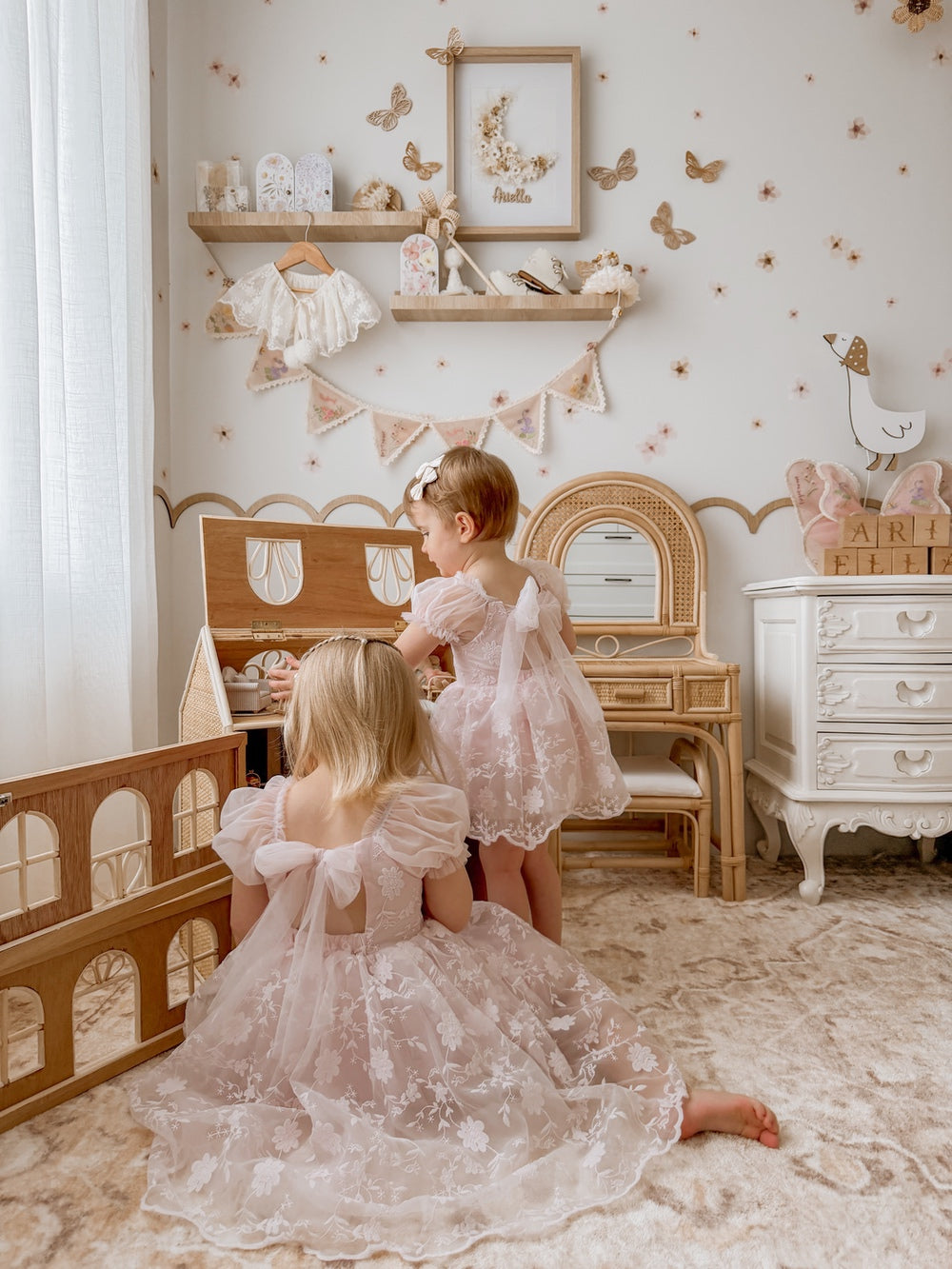 Light pink baby occasion dress with soft tulle skirt