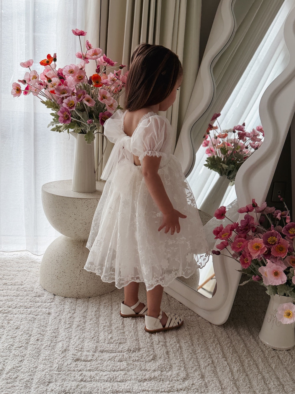 Girls ivory dress with tulle bow back