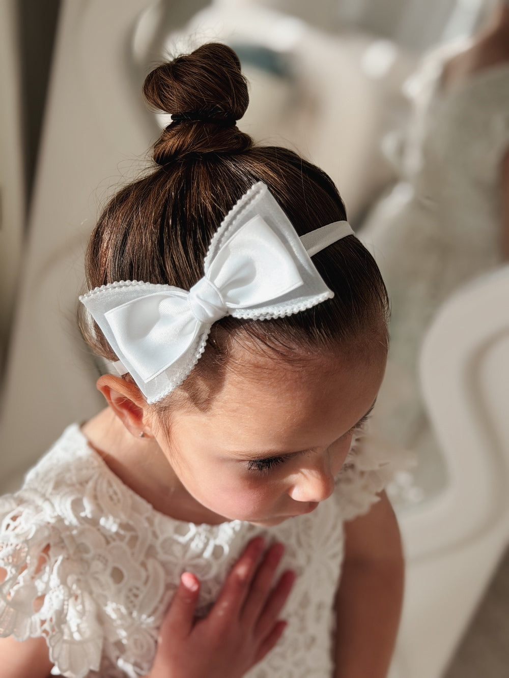 White satin bow headband for babies and girls