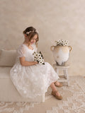 White baptism dress for girls with delicate embroidered lace details
