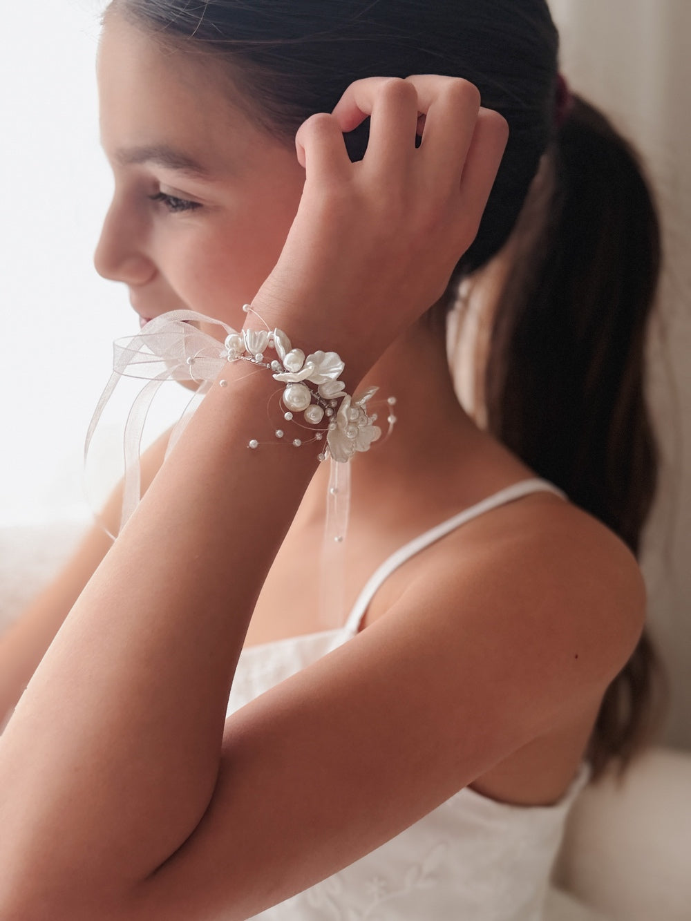 Girls ivory pearl floral wrist corsage