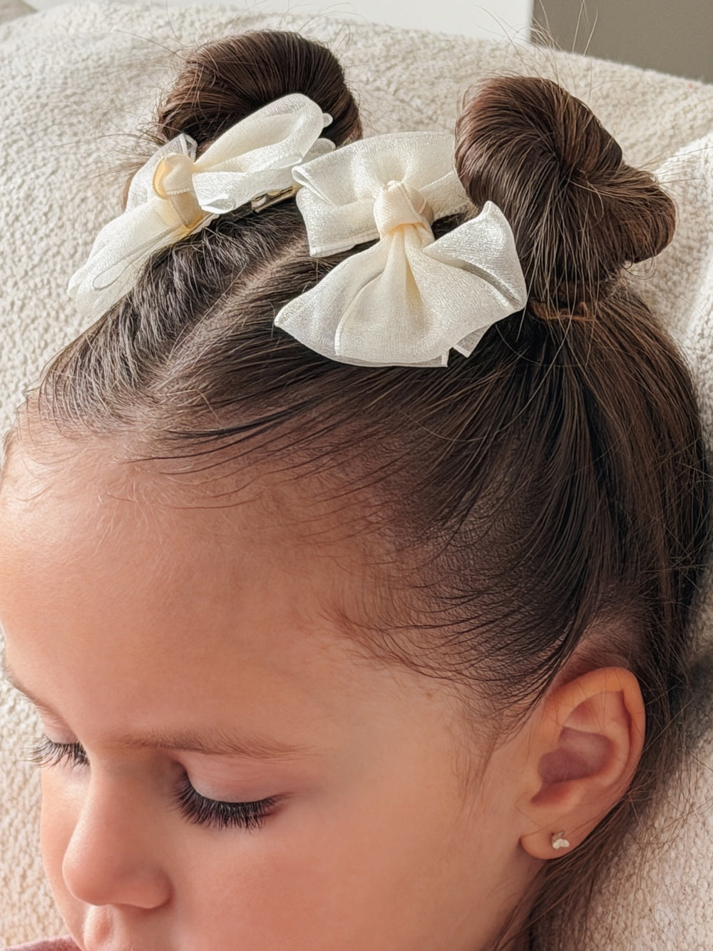 Matching ivory pigtail bows for little girls