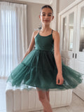Front view of the Juniper girls green Christmas dress, showing the fitted bodice and flared tulle skirt.