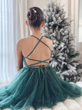 Girls green dress with adjustable straps and tulle tiered skirt.
