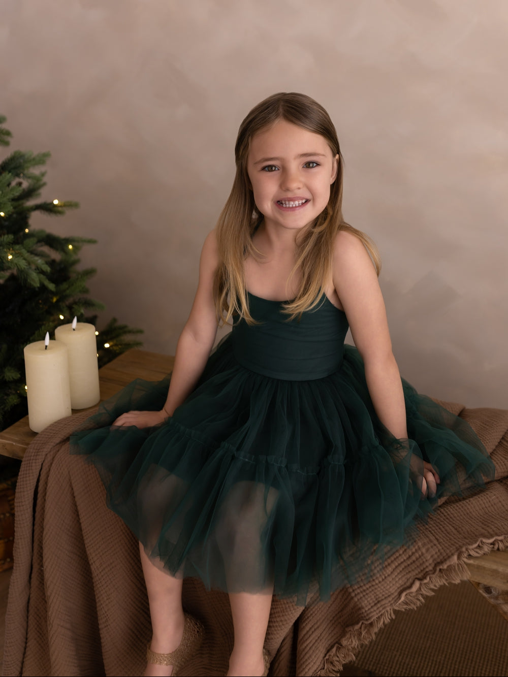Juniper girls green dress for Christmas Day celebrations