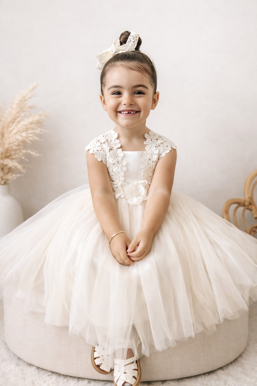Ivory flower girls dress with lace and flowers