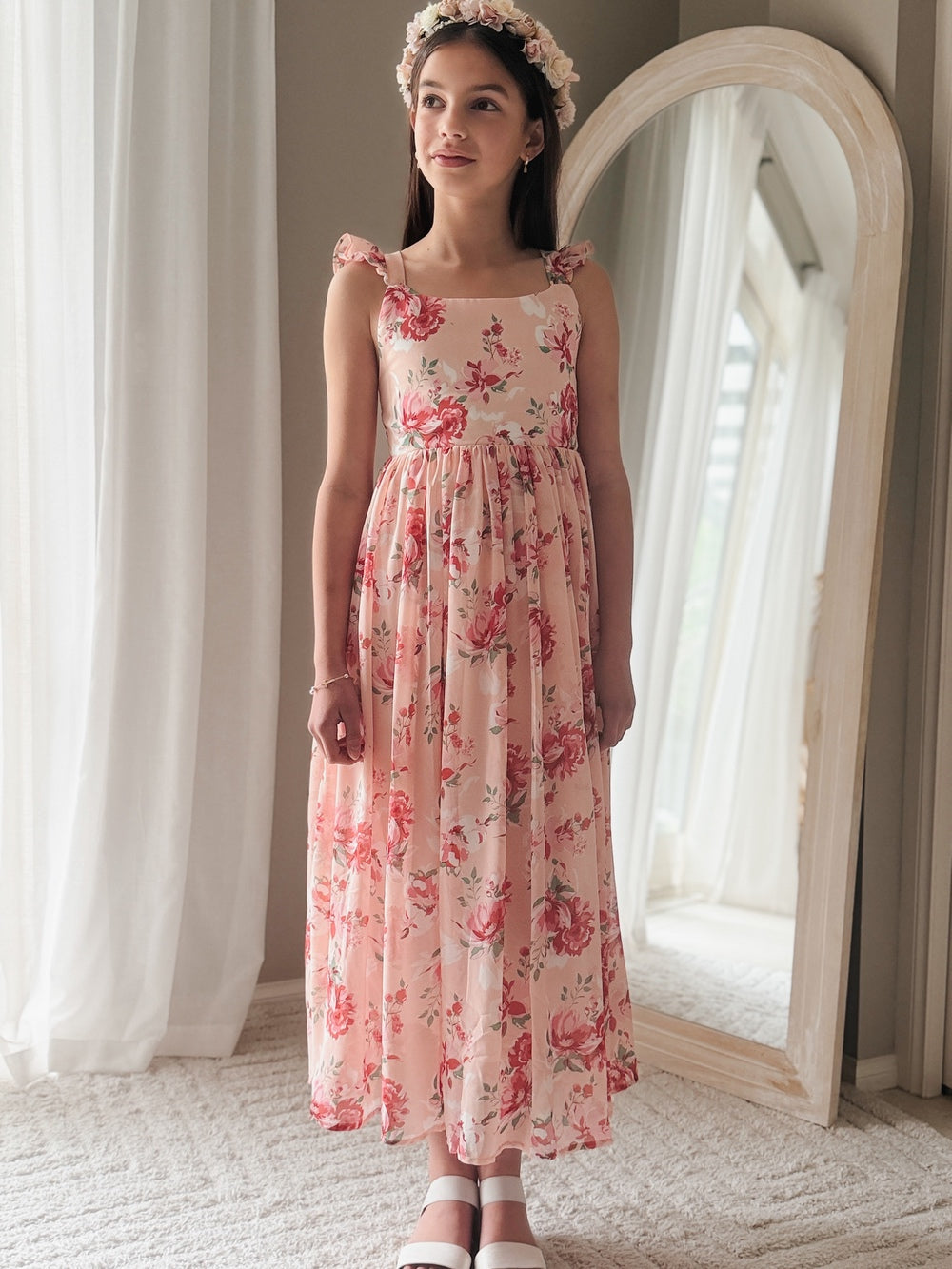 Front view of Leilani Girls Pink Floral Dress – pink background with red flower print