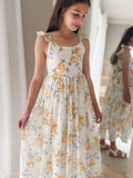 Front view of Leilani Girls Spring Floral Dress – soft floral print with ruffle shoulders