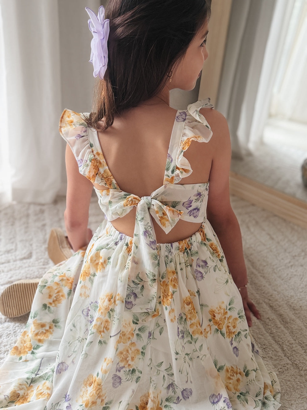 Detail shot – elastic waist and tie-up back of Leilani Girls Spring Floral Dress