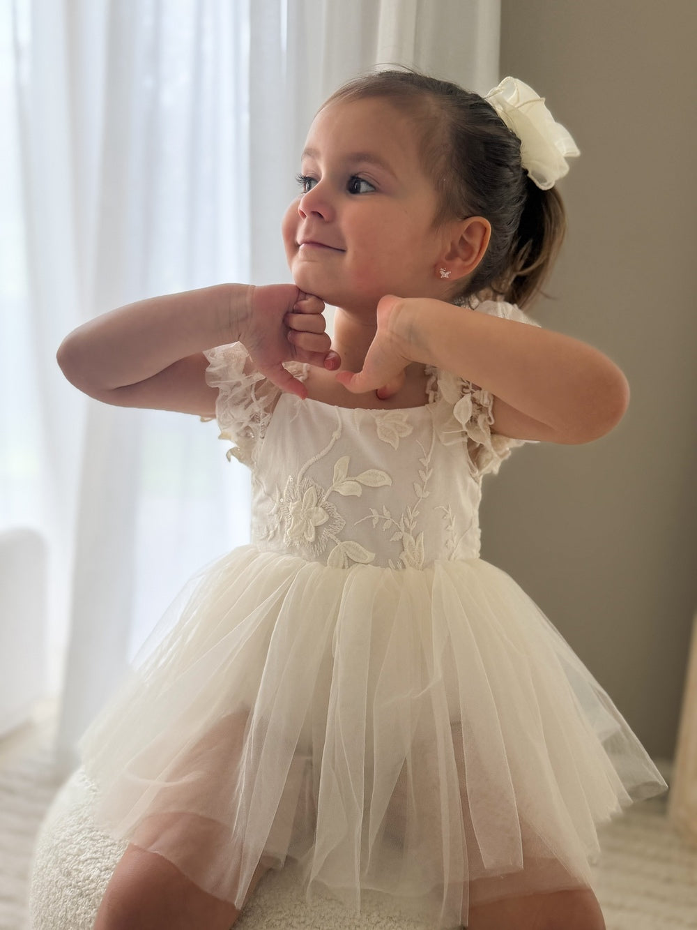 Lila Ivory Embroidered Baby DressFront view of Lila Ivory Embroidered Baby Dress – puff sleeves and delicate embroidery