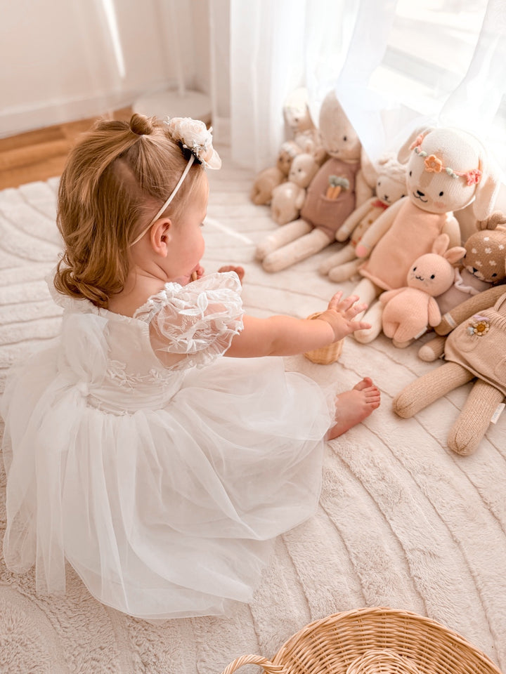 Lila Embroidered Girls Dress in white with puff sleeves
