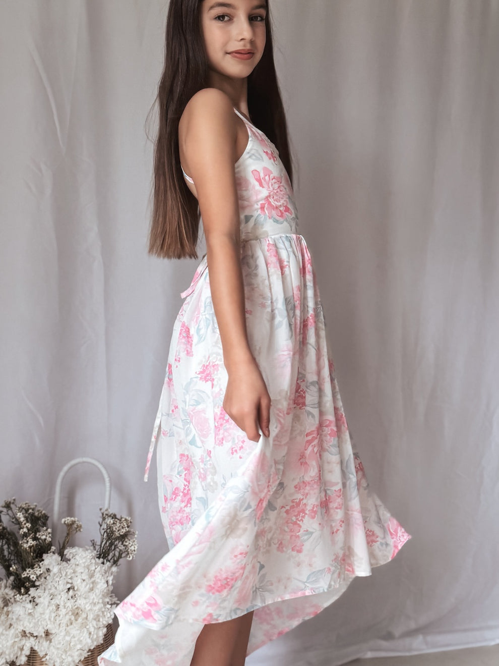Side angle of the high-low hem on the Lola Pink Dream Dress.