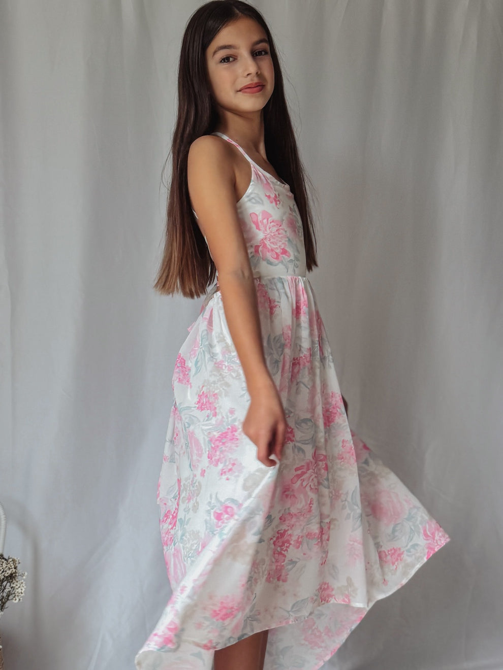 Detail of lightweight rayon fabric and girl twirling